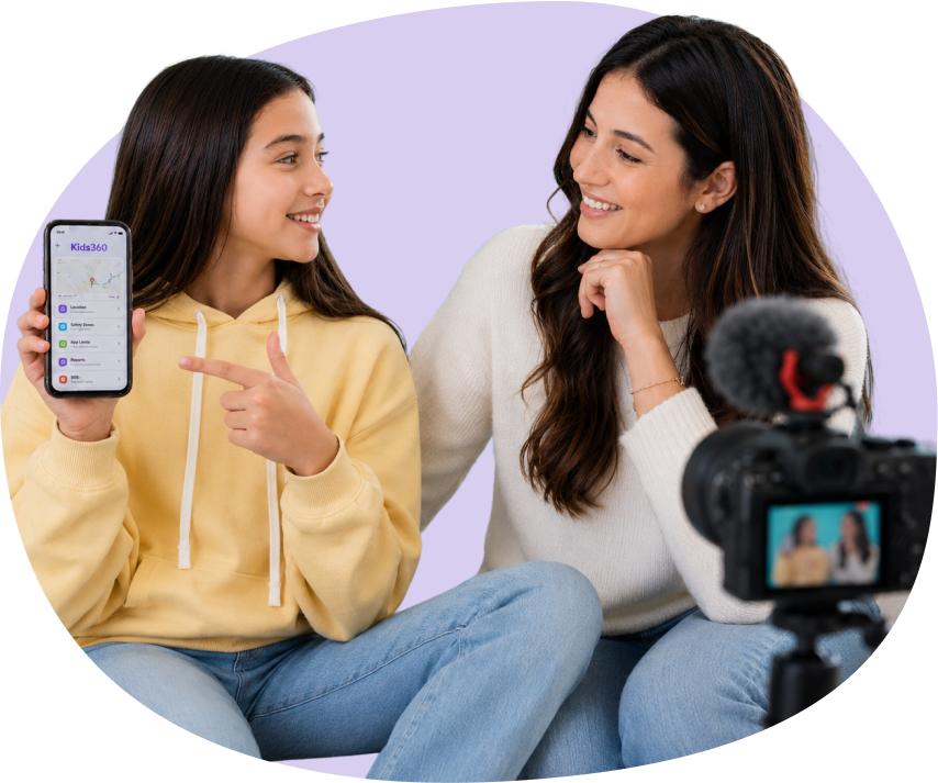 Mother and daughter showing the Kids360 parental control app
